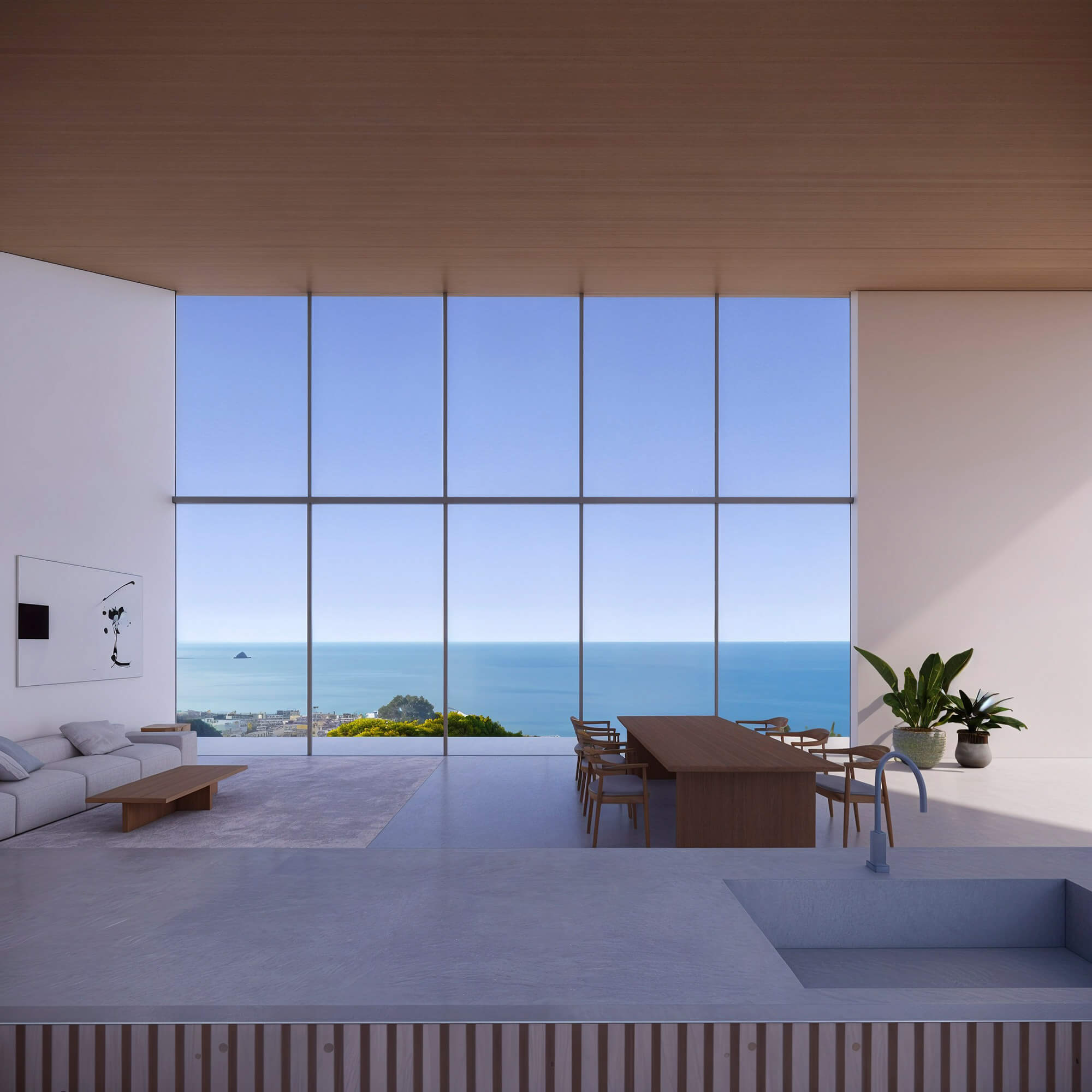 Modern living area with a vast ocean horizon and floor-to-ceiling windows