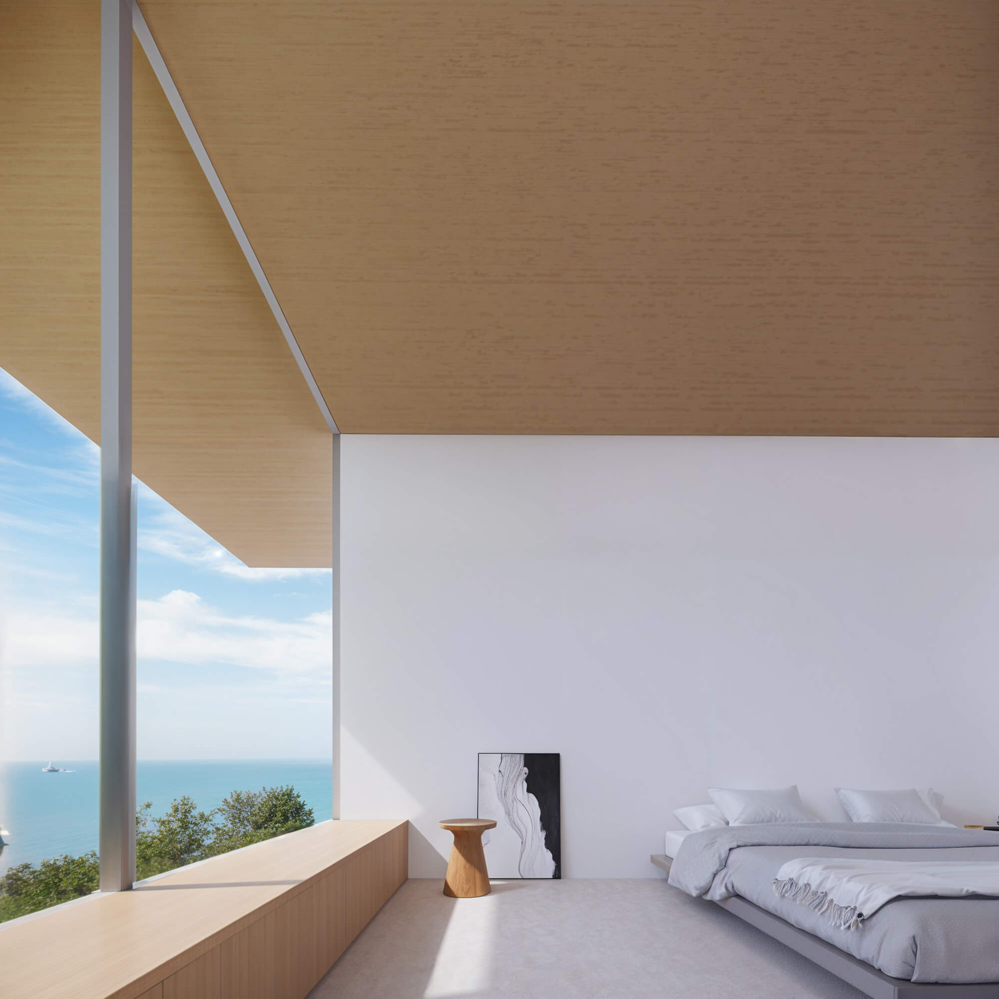 Bedroom with a large window offering an ocean view