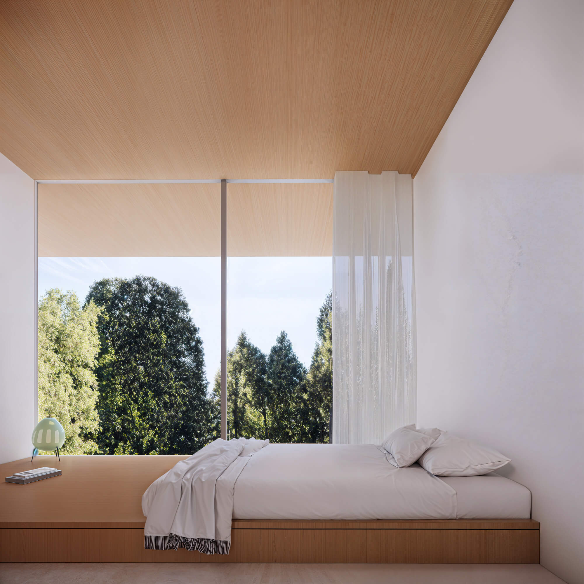 Natural bedroom with a sense of openness and a view of the forest