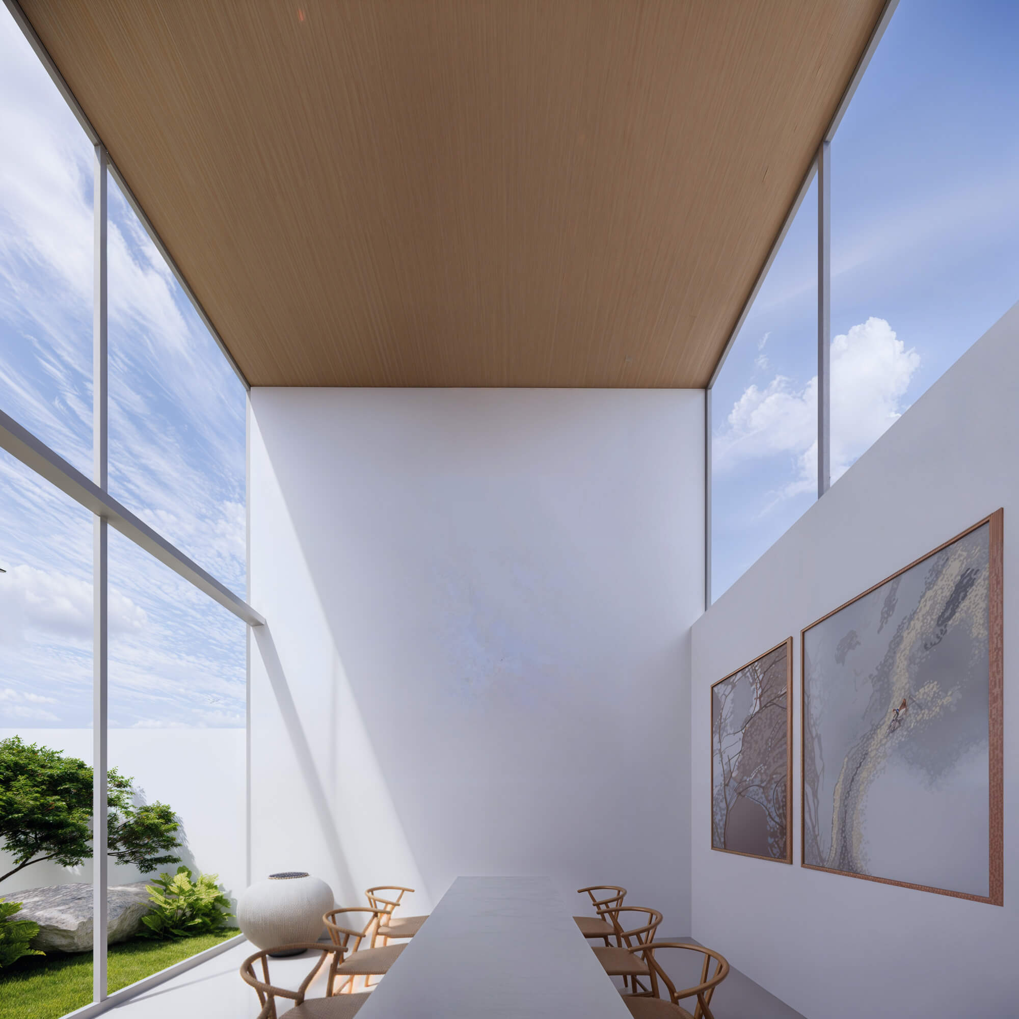 Dining space with high ceilings and natural light pouring in from large openings