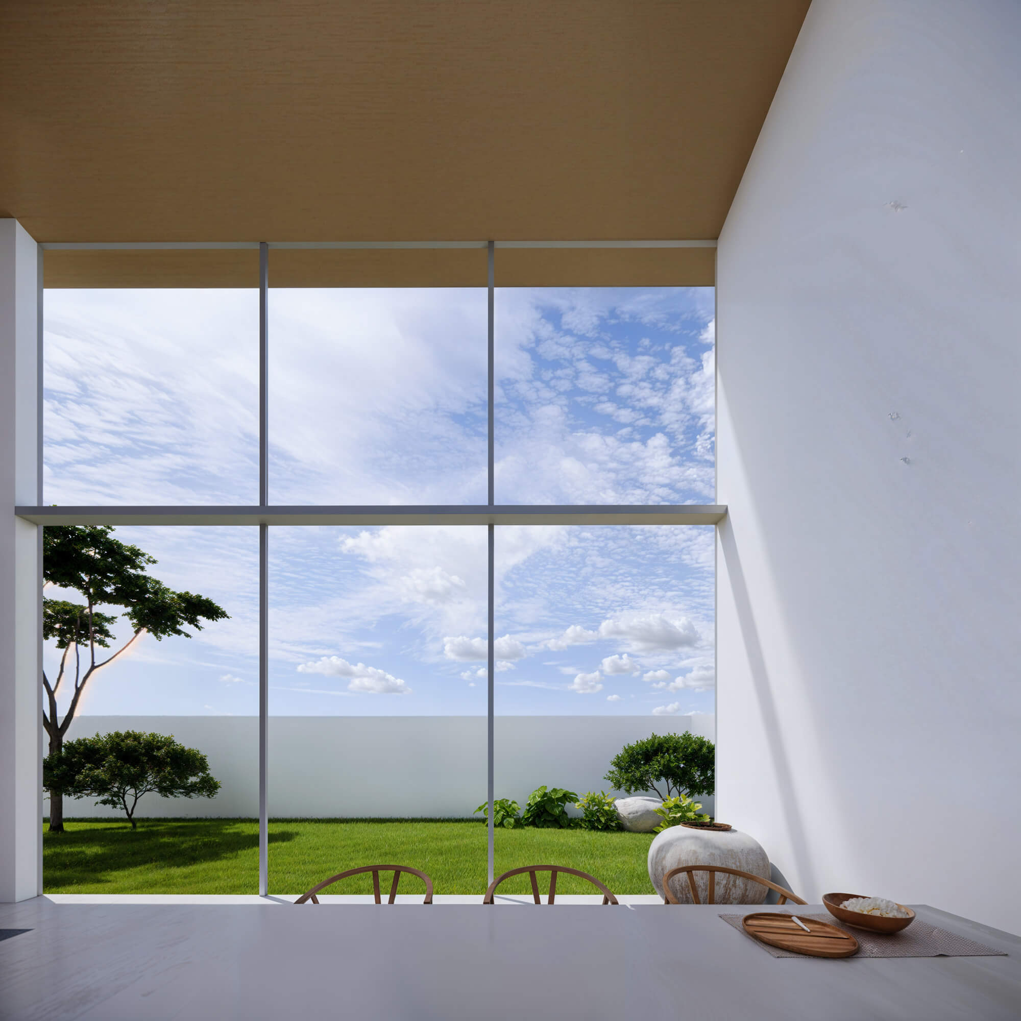 Window-side dining bench with ocean view