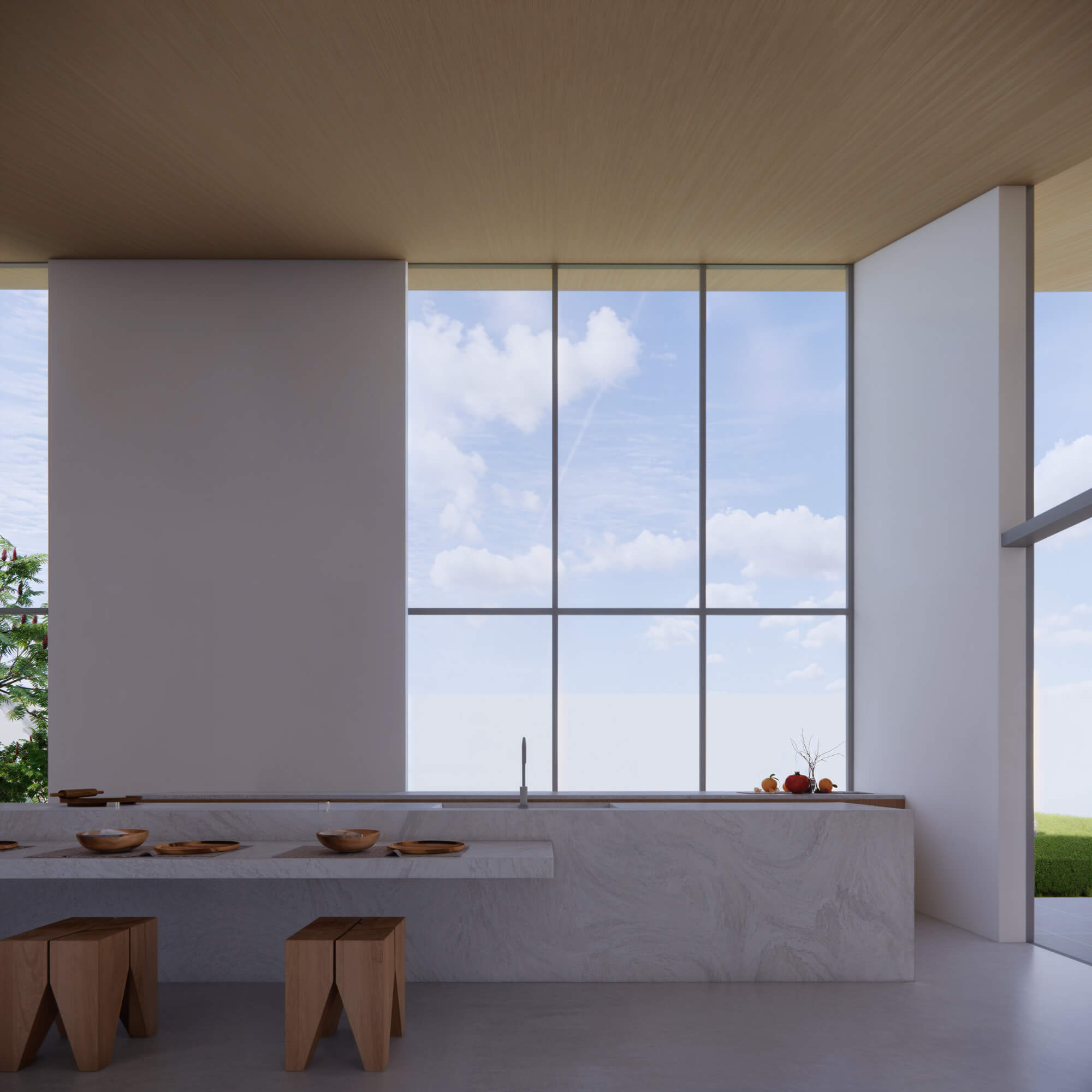 Modern kitchen with marble countertop and high windows