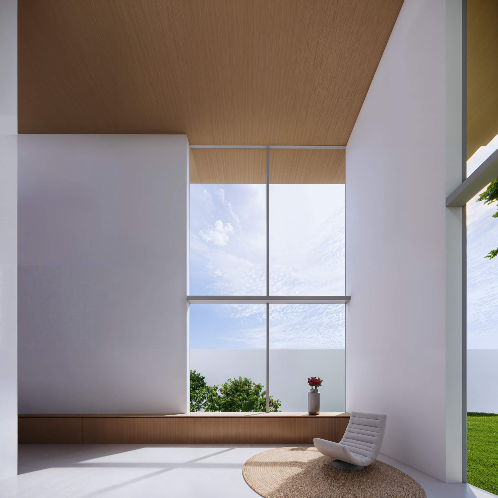 Minimalist living space with round rug and floor cushions by the window