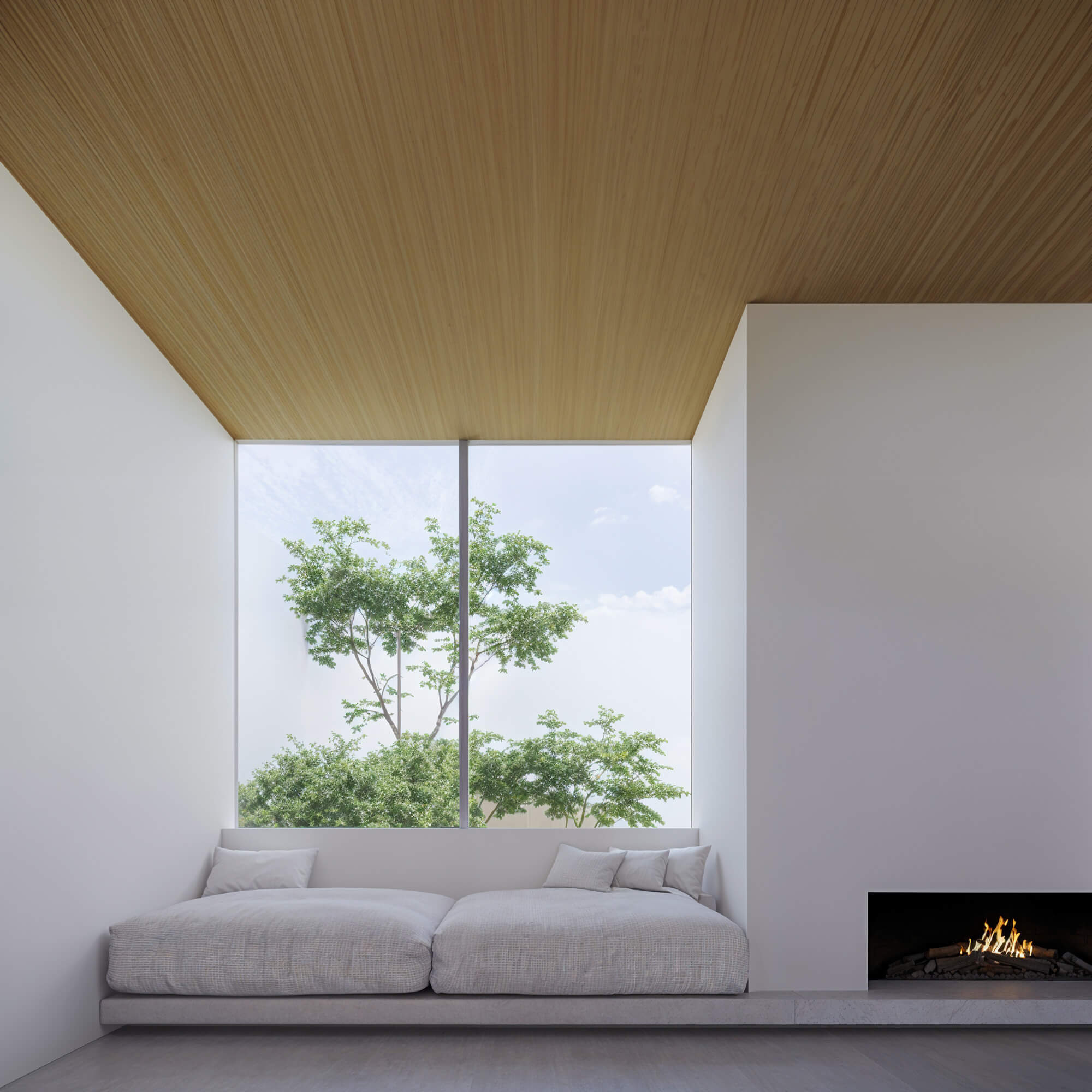 Living area in soft natural light with a white color scheme