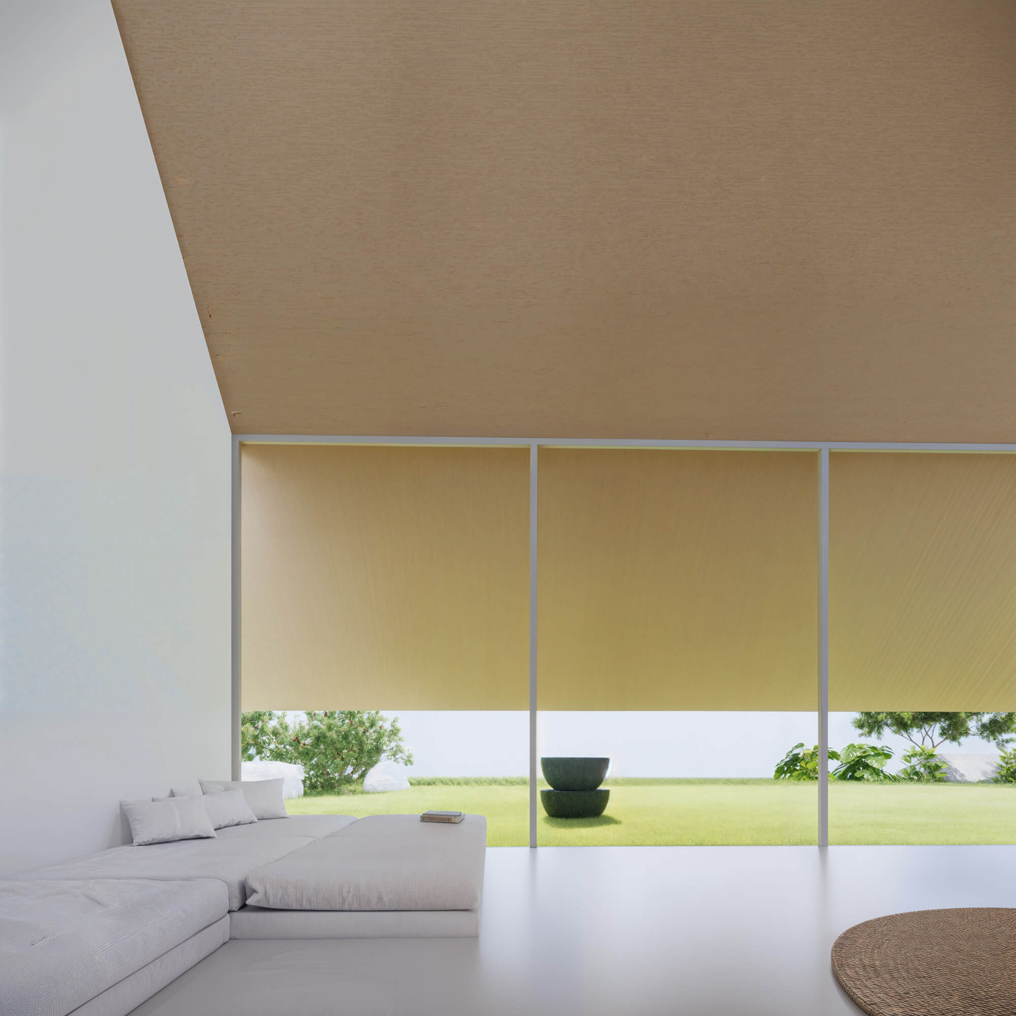Simple living room featuring roll screens and expansive greenery outside
