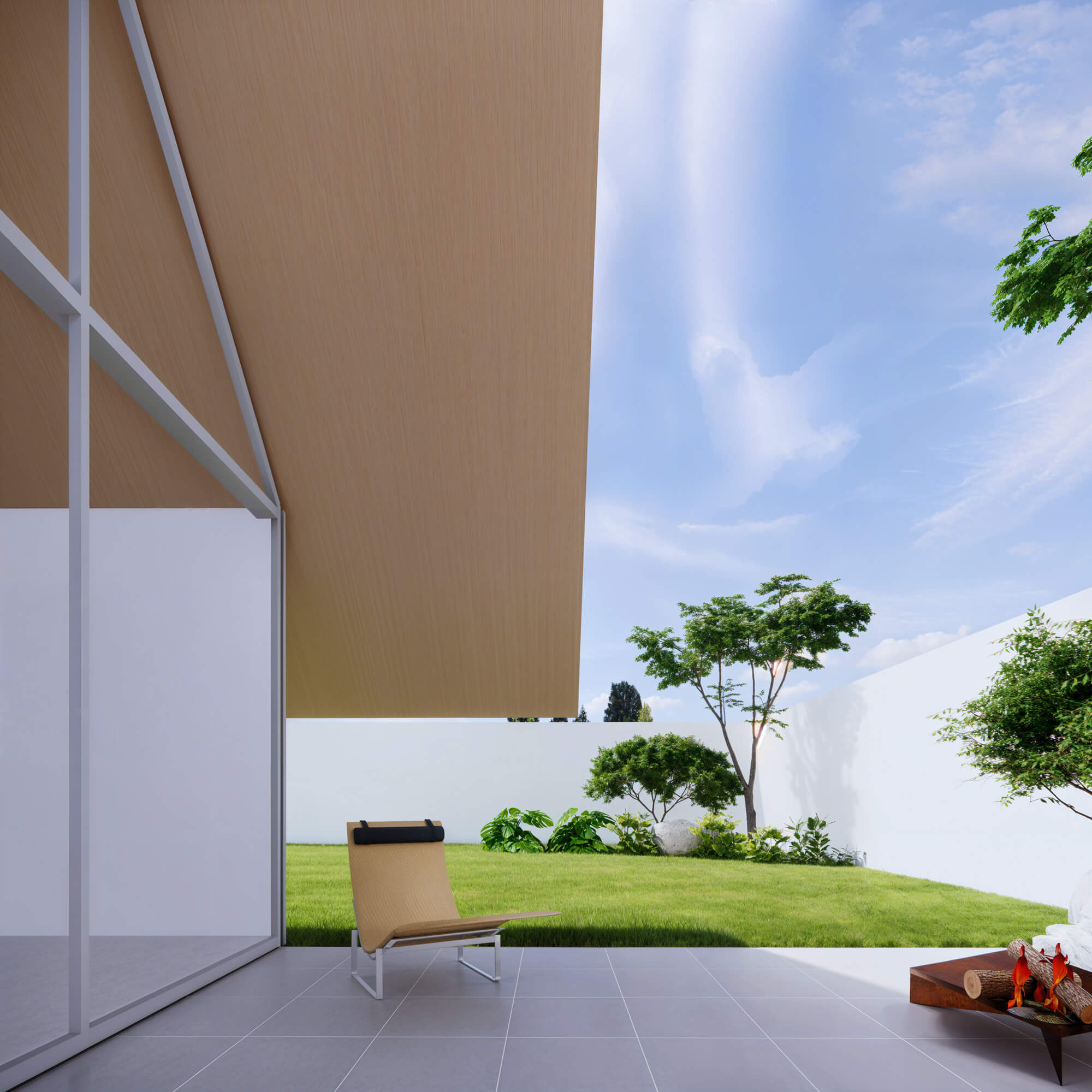 Patio-style area with lounge chairs and a spread of grass and plants