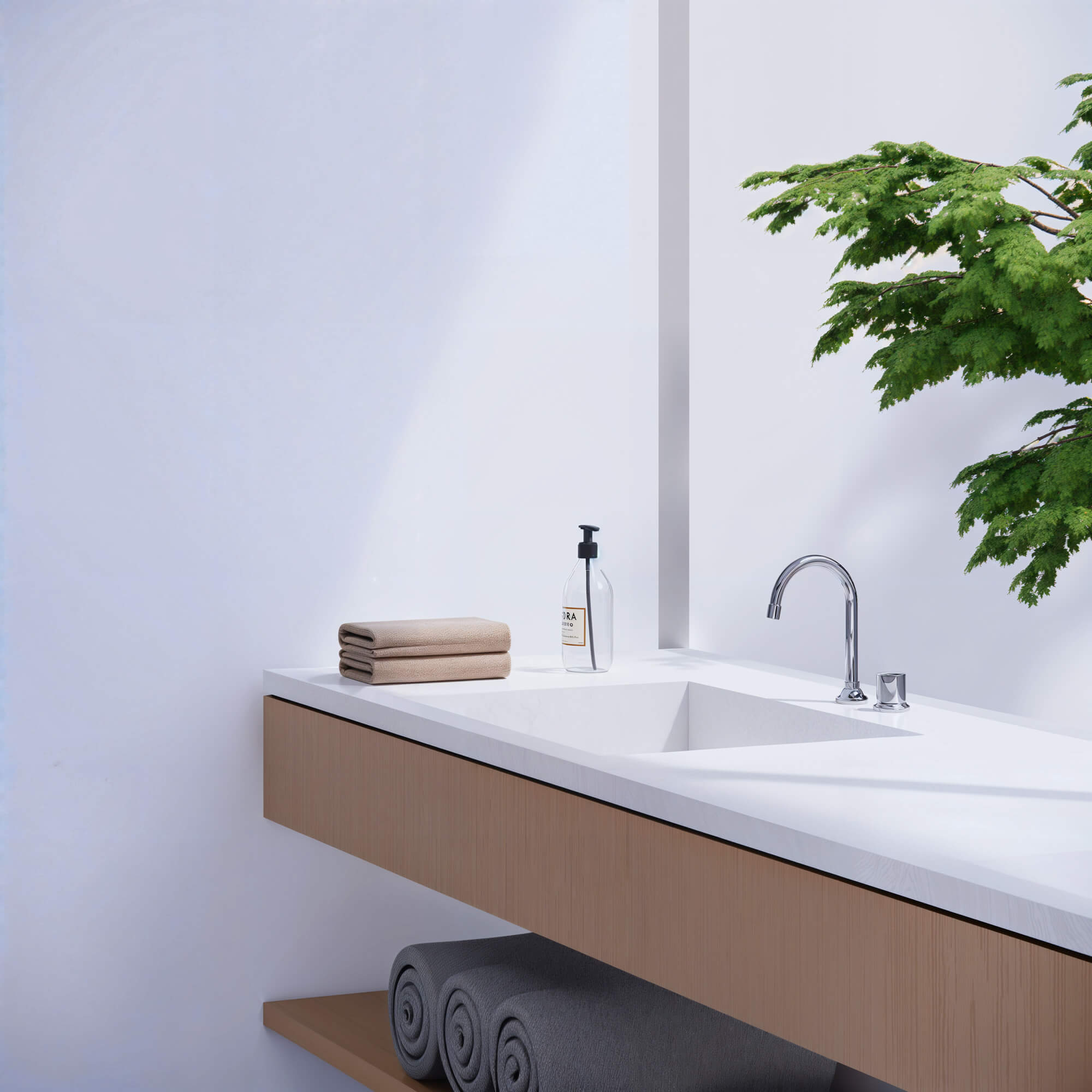 Simple washbasin with towels stored beneath a wooden counter