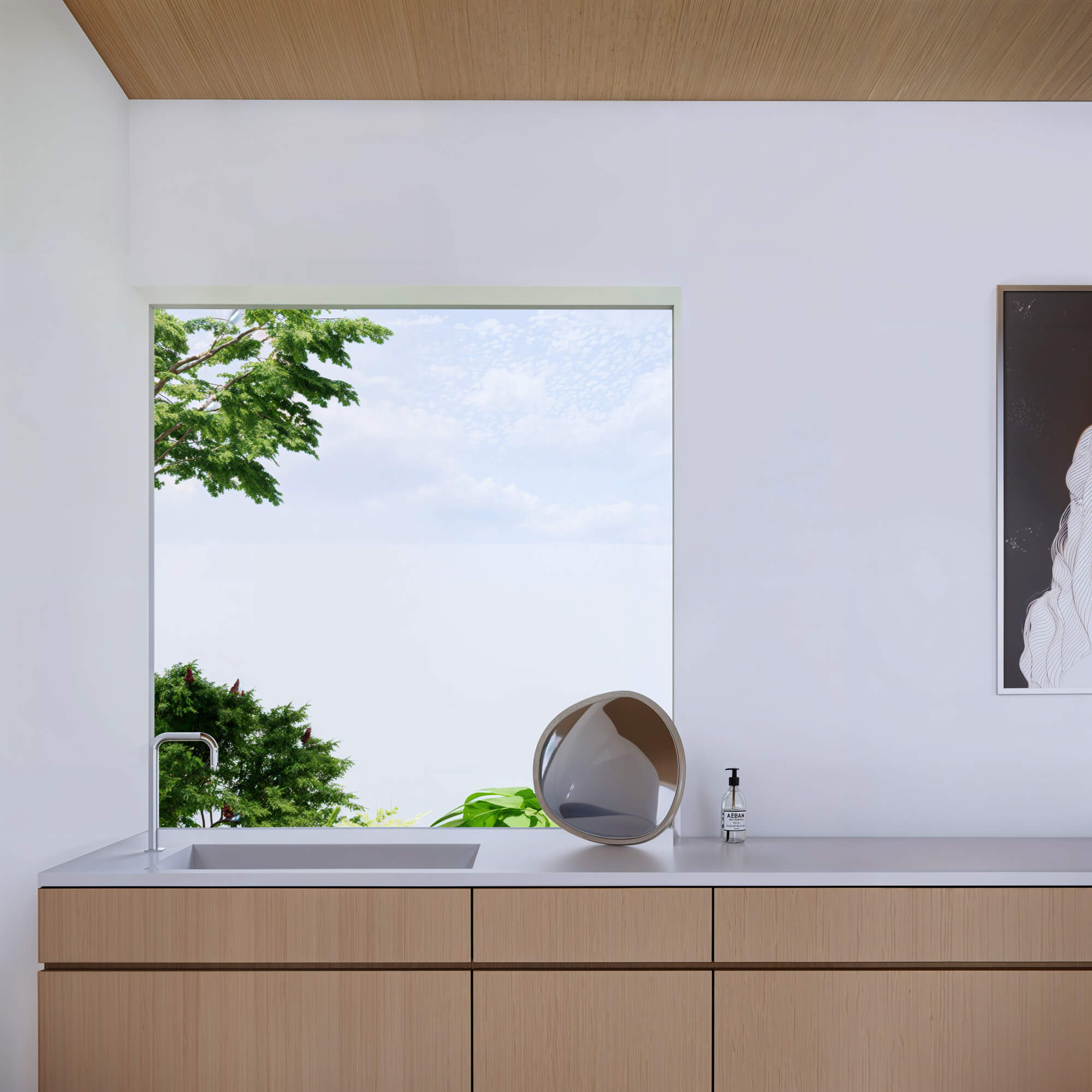 Compact wash area with wooden storage and a large mirror