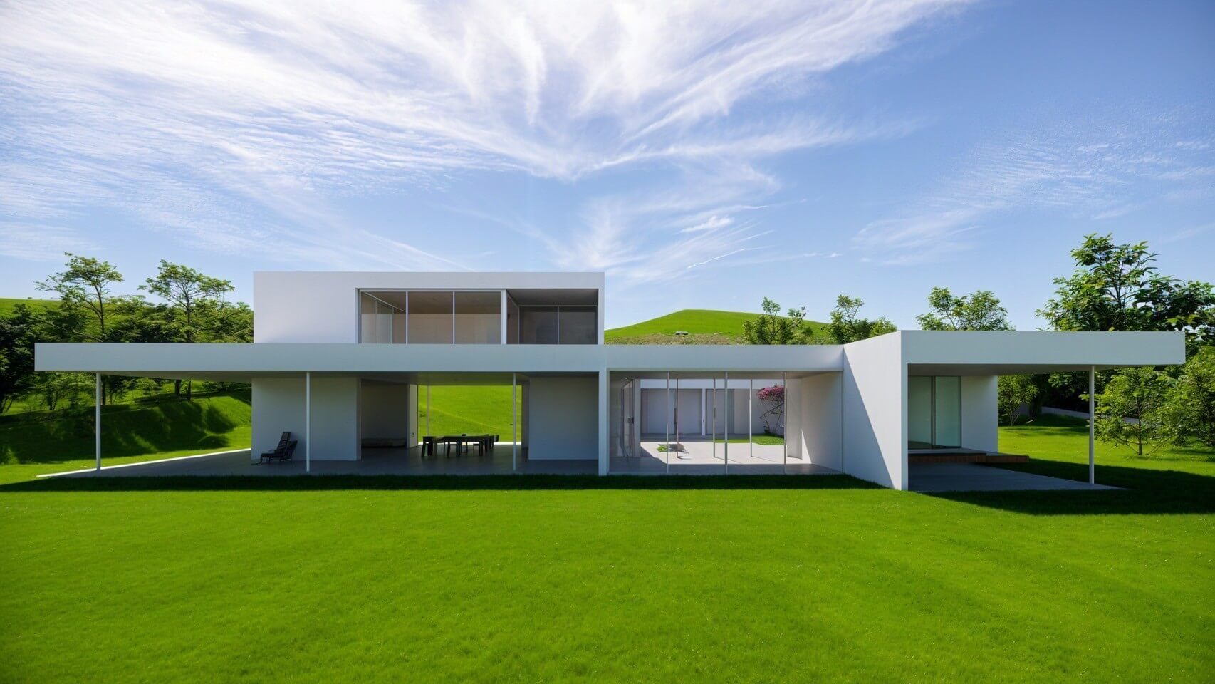 The exterior of a Lake Toya residence harmonizing expansive lawns with white modern architecture
