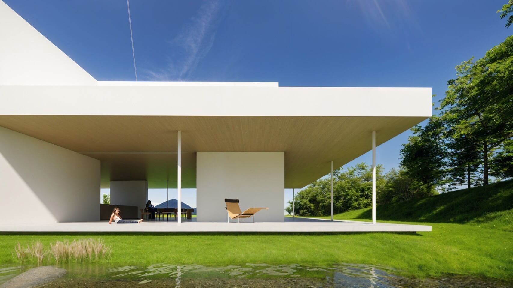 The exterior of a modern white residence with a terrace overlooking a pond, harmonizing with nature